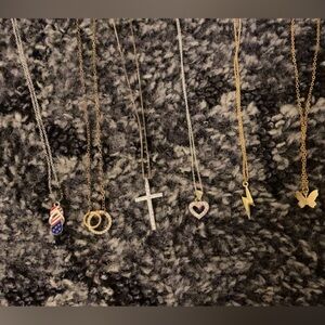 all necklaces have never been worn. they’re also all a decent length.